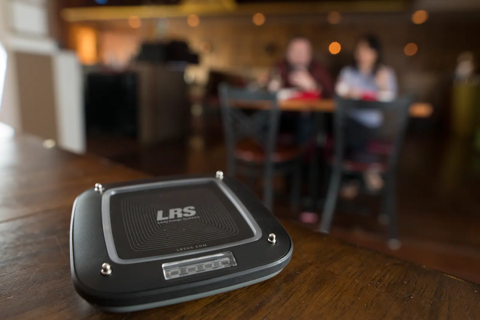 LRS coaster on a restaurant table